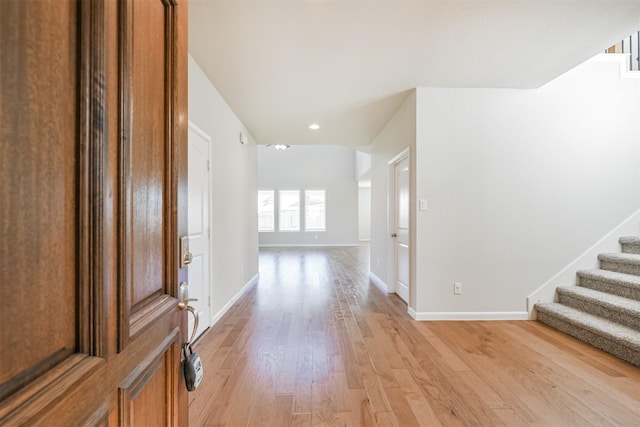 foyer entrance with light wood-type flooring