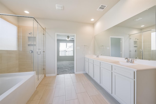 bathroom with ceiling fan, vanity, and independent shower and bath