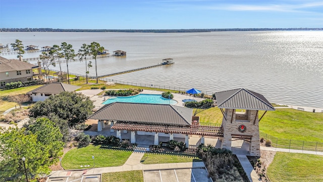 birds eye view of property featuring a water view