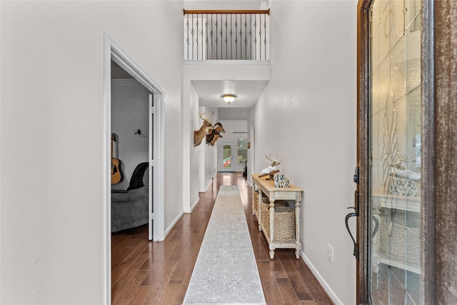 foyer entrance with a towering ceiling