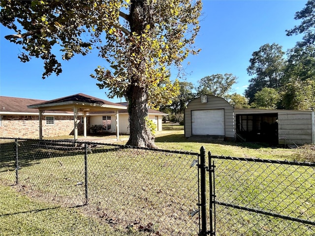 view of yard with a gazebo and an outdoor structure