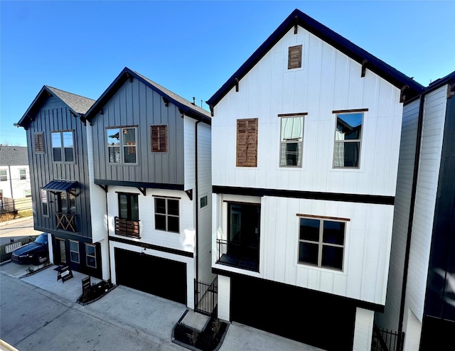 modern farmhouse featuring a garage