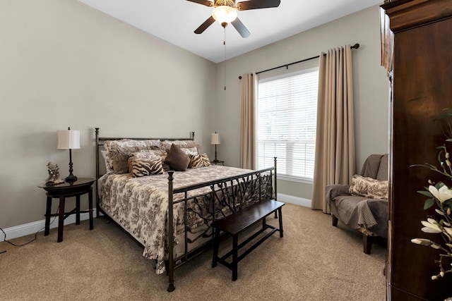 bedroom with light carpet and ceiling fan