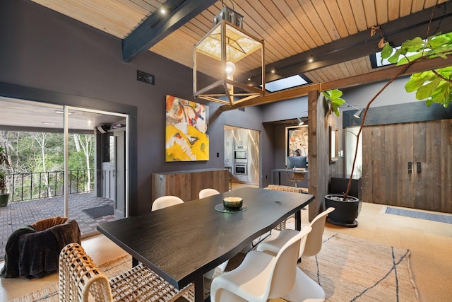 dining room with wooden ceiling and beamed ceiling