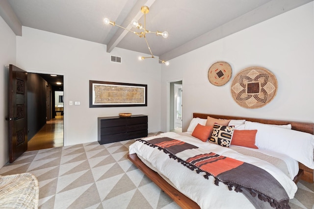 bedroom featuring an inviting chandelier and beam ceiling