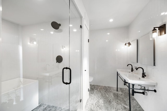 bathroom featuring toilet, tile walls, walk in shower, and sink