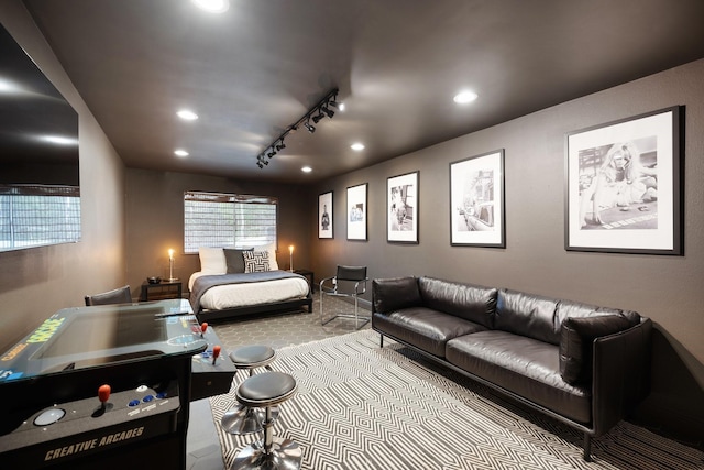 bedroom featuring track lighting