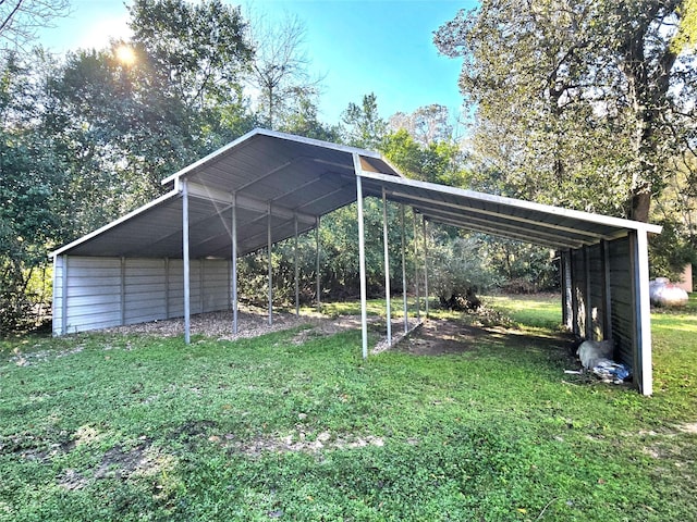 view of vehicle parking featuring a lawn and a carport