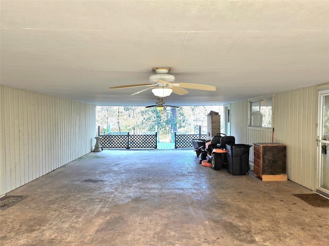 interior space featuring ceiling fan