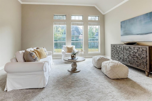 living room featuring carpet, ornamental molding, and vaulted ceiling