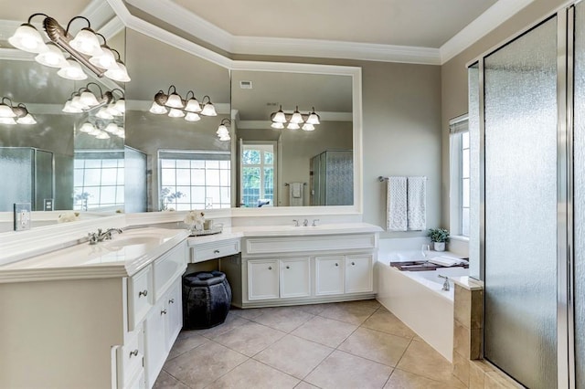 bathroom with plus walk in shower, vanity, crown molding, and tile patterned flooring