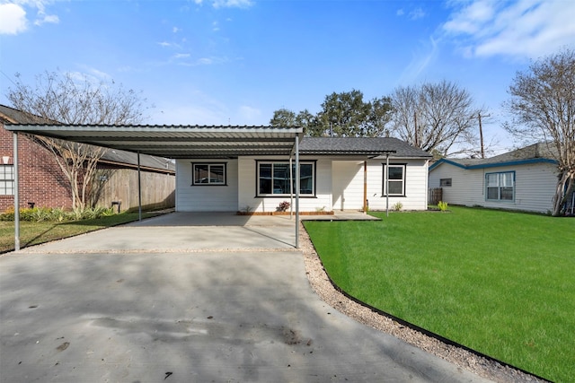 single story home with a carport and a front yard