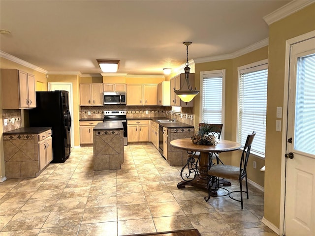 kitchen featuring light brown cabinetry, tasteful backsplash, a center island, hanging light fixtures, and black appliances