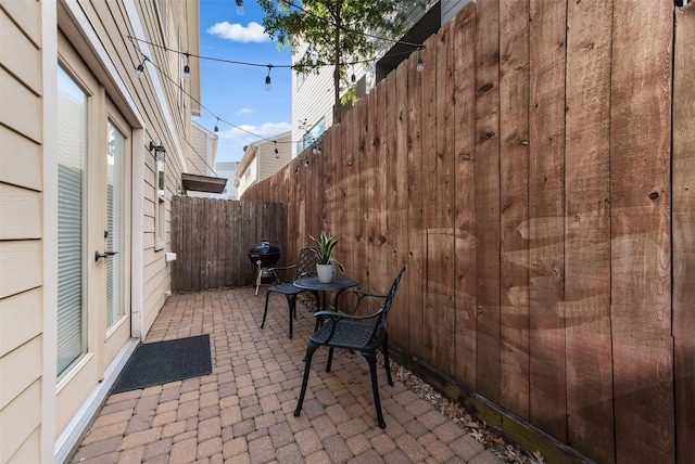 view of patio featuring french doors