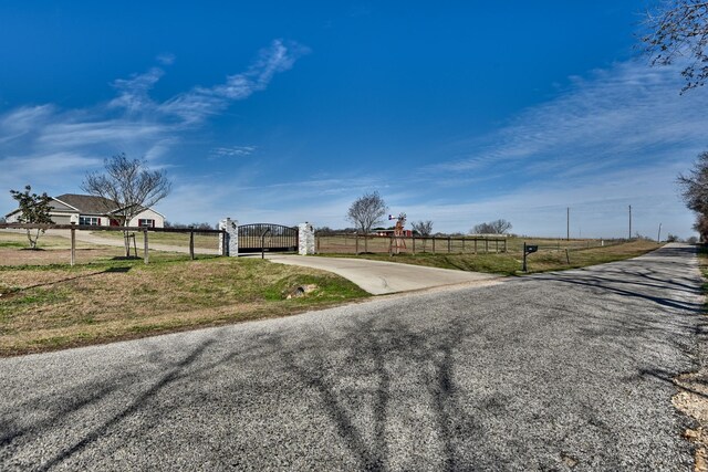 view of road featuring a rural view