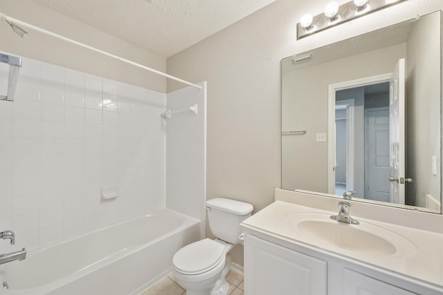 full bathroom with a textured ceiling, tiled shower / bath combo, tile patterned floors, vanity, and toilet