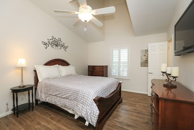 bedroom featuring ceiling fan, dark wood-type flooring, and high vaulted ceiling