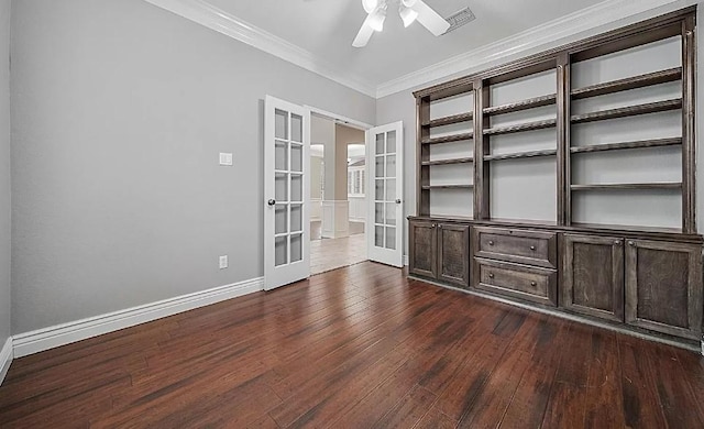 unfurnished room with ceiling fan, french doors, dark wood-type flooring, and crown molding