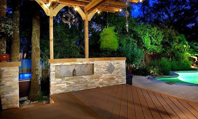 view of patio with a swimming pool side deck