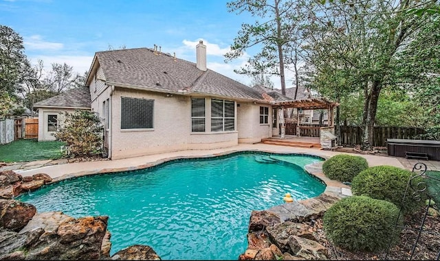 view of pool with a patio area, a hot tub, a pergola, and a wooden deck