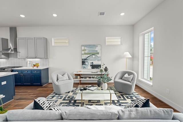 living room with dark hardwood / wood-style floors