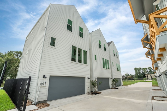 view of side of property with a garage