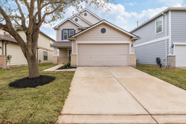 view of front of property with a front lawn and a garage