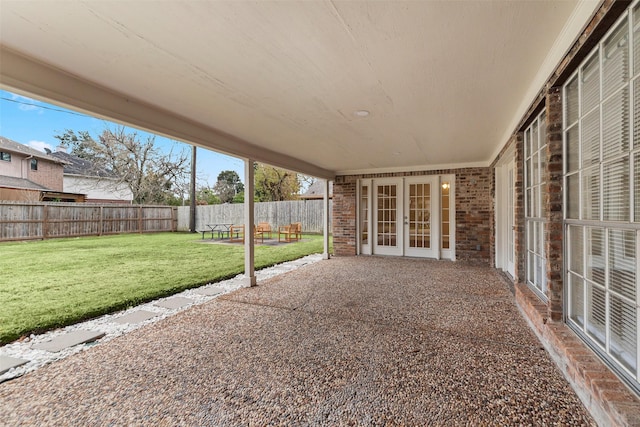 view of patio / terrace featuring french doors and a fenced backyard