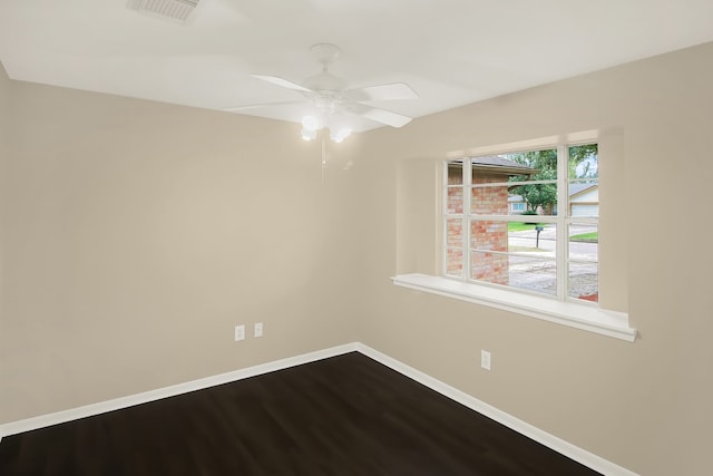 spare room featuring ceiling fan and wood-type flooring