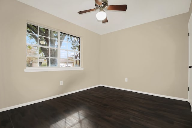 spare room featuring ceiling fan and hardwood / wood-style floors