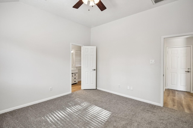 unfurnished bedroom with ceiling fan and carpet flooring