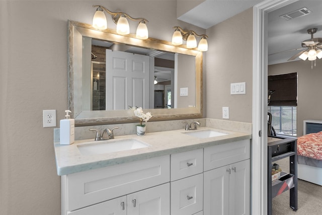 bathroom featuring vanity and ceiling fan