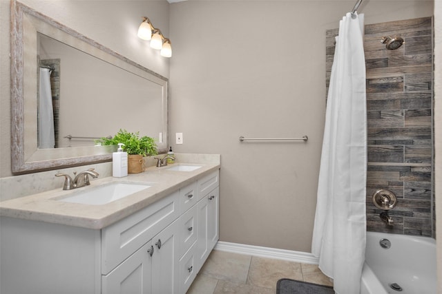 bathroom with shower / tub combo with curtain, vanity, and tile patterned flooring