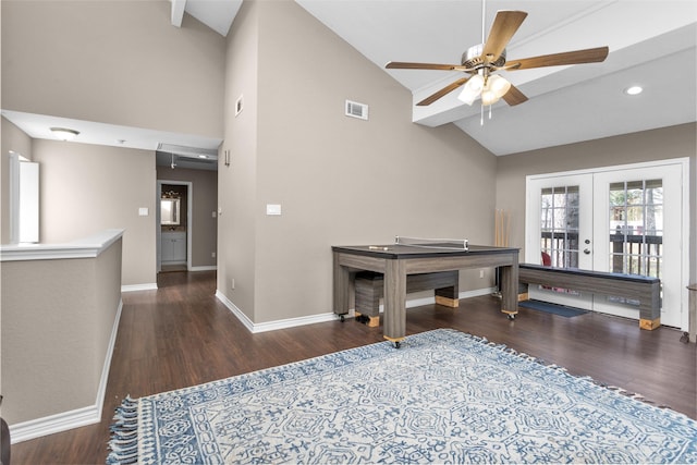 rec room with dark hardwood / wood-style flooring, high vaulted ceiling, french doors, and ceiling fan