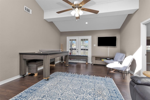 interior space with lofted ceiling, dark hardwood / wood-style floors, french doors, and ceiling fan