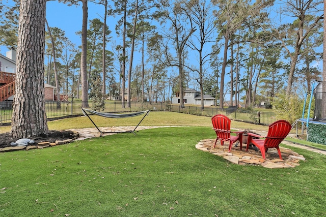 view of yard featuring a trampoline