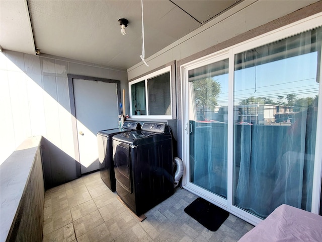 exterior space featuring washer and clothes dryer