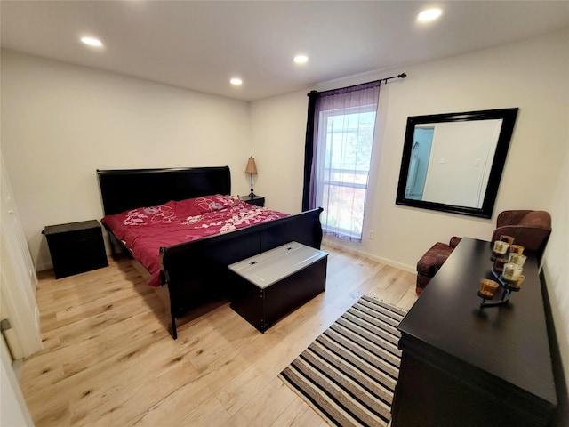 bedroom with light hardwood / wood-style floors