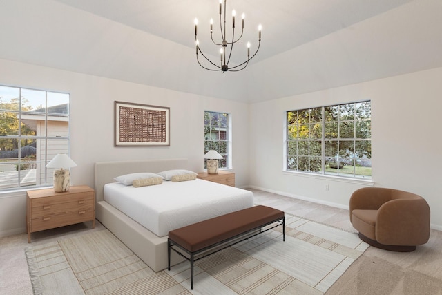 carpeted bedroom featuring vaulted ceiling and an inviting chandelier