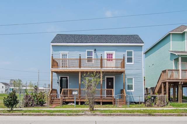 view of front of property with a balcony