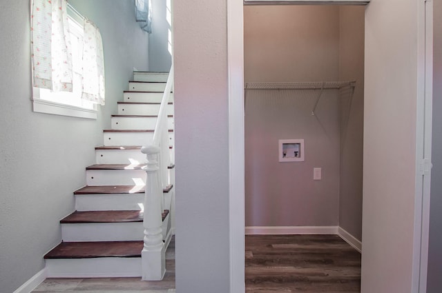 stairs with baseboards and wood finished floors