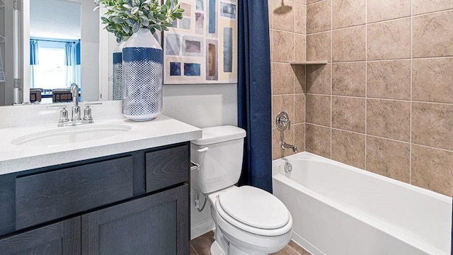 full bathroom featuring toilet, vanity, and shower / bath combo