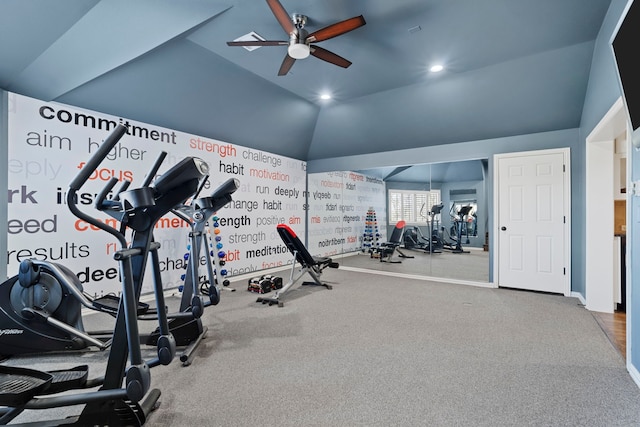 workout area featuring vaulted ceiling and ceiling fan