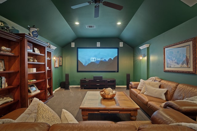 cinema room featuring vaulted ceiling, ceiling fan, and carpet