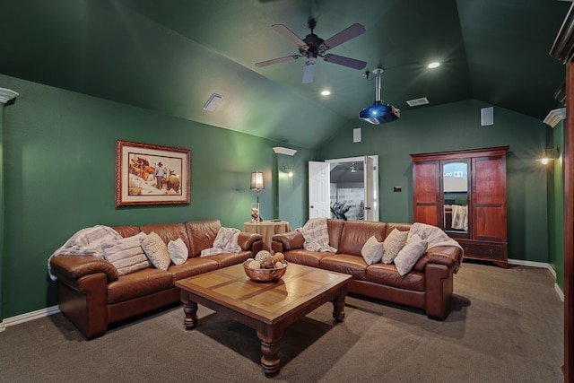 cinema room featuring ceiling fan, vaulted ceiling, and carpet