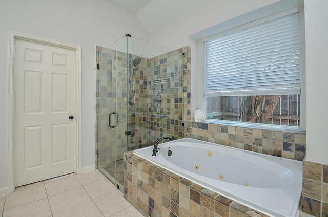 bathroom featuring vaulted ceiling, tile patterned floors, and plus walk in shower