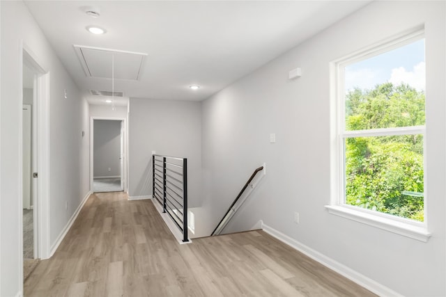 hallway with light wood-type flooring