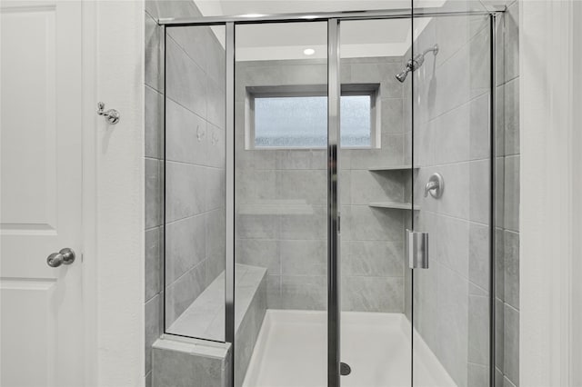 bathroom with an enclosed shower