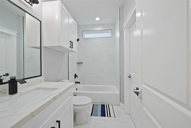 full bathroom with toilet, vanity, and tiled shower / bath combo