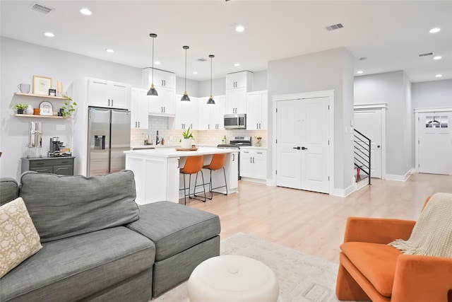 living room with light wood-type flooring